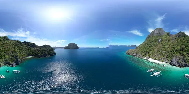 Paysage marin avec des îles rocheuses et des bateaux à l'horizon