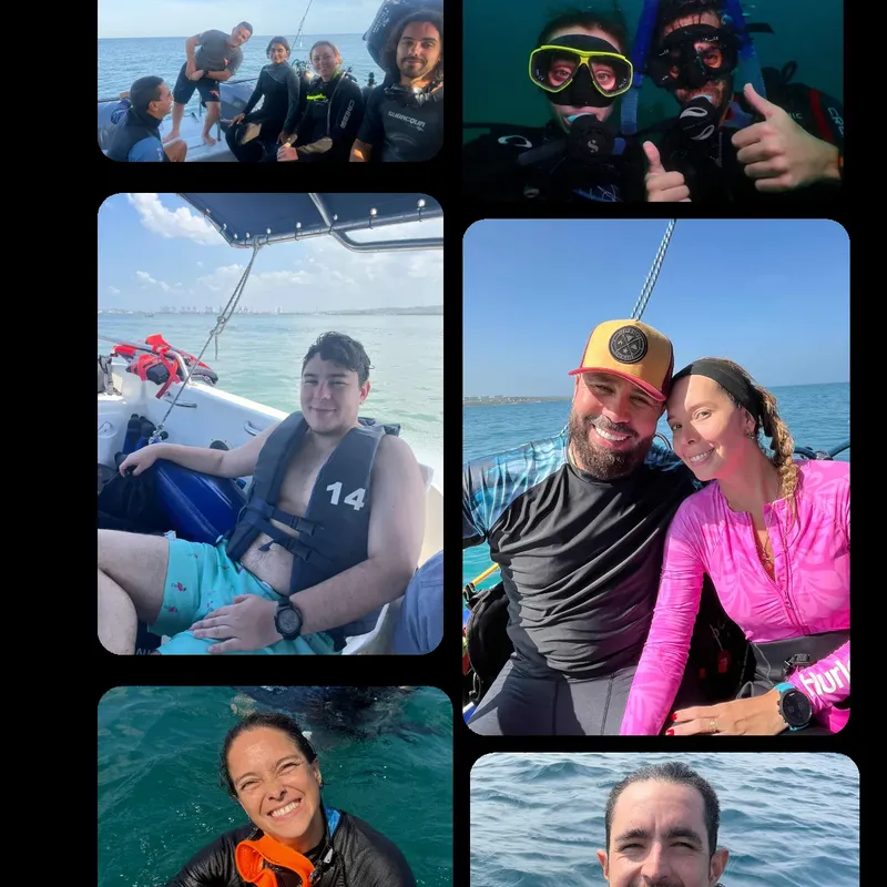 Plongée : plusieurs personnes sourient, équipées, sur un bateau en mer