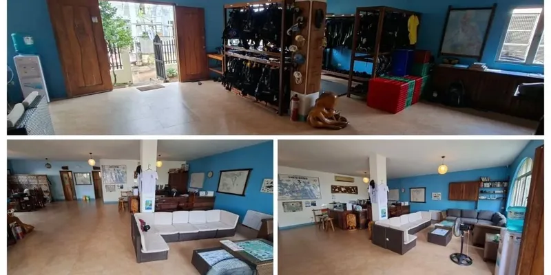 Intérieur d'un centre de plongée avec équipement et espace détente