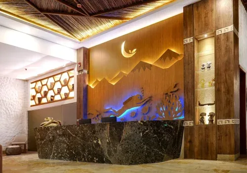 Intérieur d'un centre de plongée avec un comptoir décoratif et lumineux