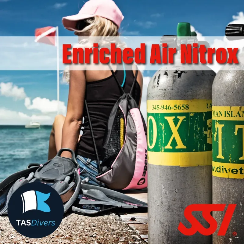 Plongeuse préparant son équipement avec des bouteilles de Nitrox
