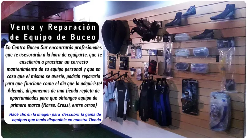 Boutique de plongée avec des combinaisons, des gilets et du matériel visible