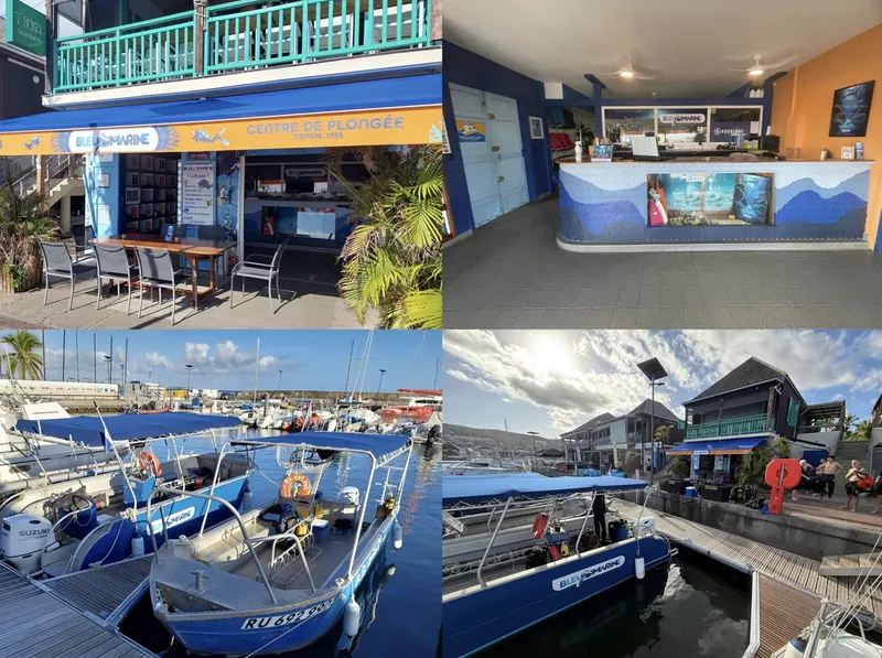Façade d'un centre de plongée et bateaux amarrés au port