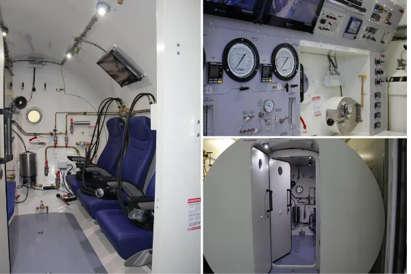 Intérieur d'une chambre de recompression avec sièges et équipements de contrôle