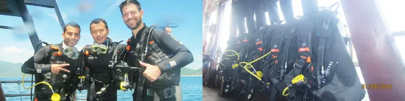 Deux plongeurs souriants avec leur équipement sur un bateau en mer