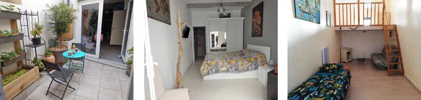Intérieur d'une chambre avec lit, étagères et escalier bois