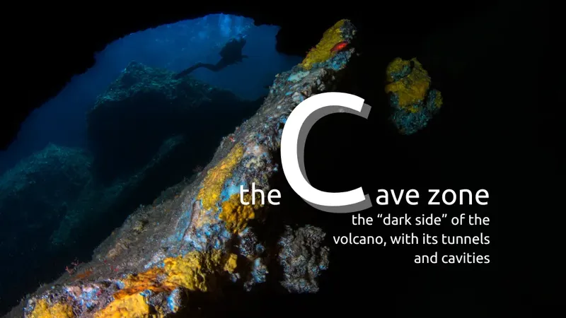 Plongeur explorant une grotte sous-marine volcanique sombre et colorée