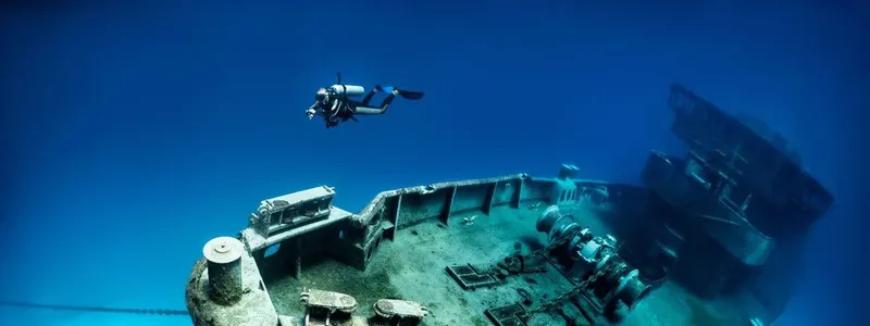Plongeur explorant l'épave d'un navire sous-marin bleu profond