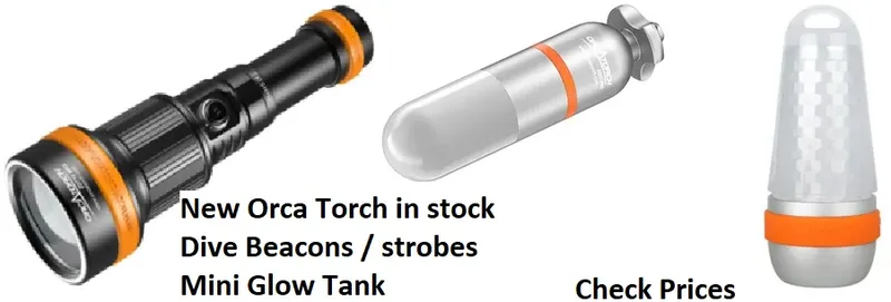 Trois équipements de plongée : lampe torche, balise et mini réservoir