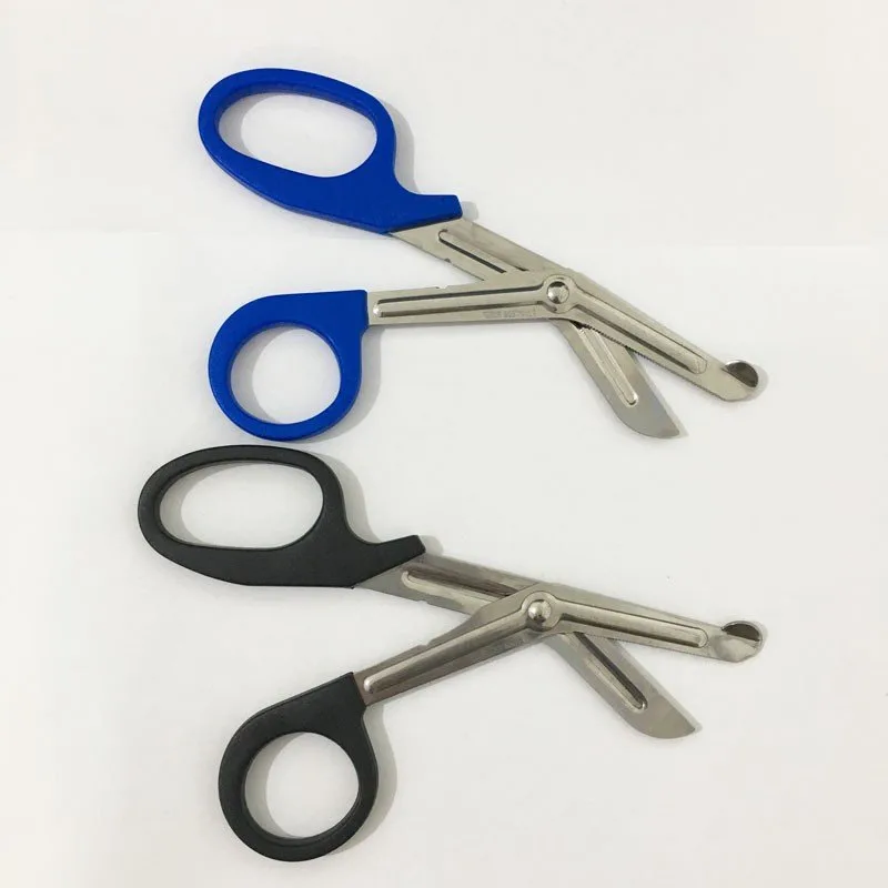 Ciseaux de premiers secours médicaux en métal avec poignées colorées