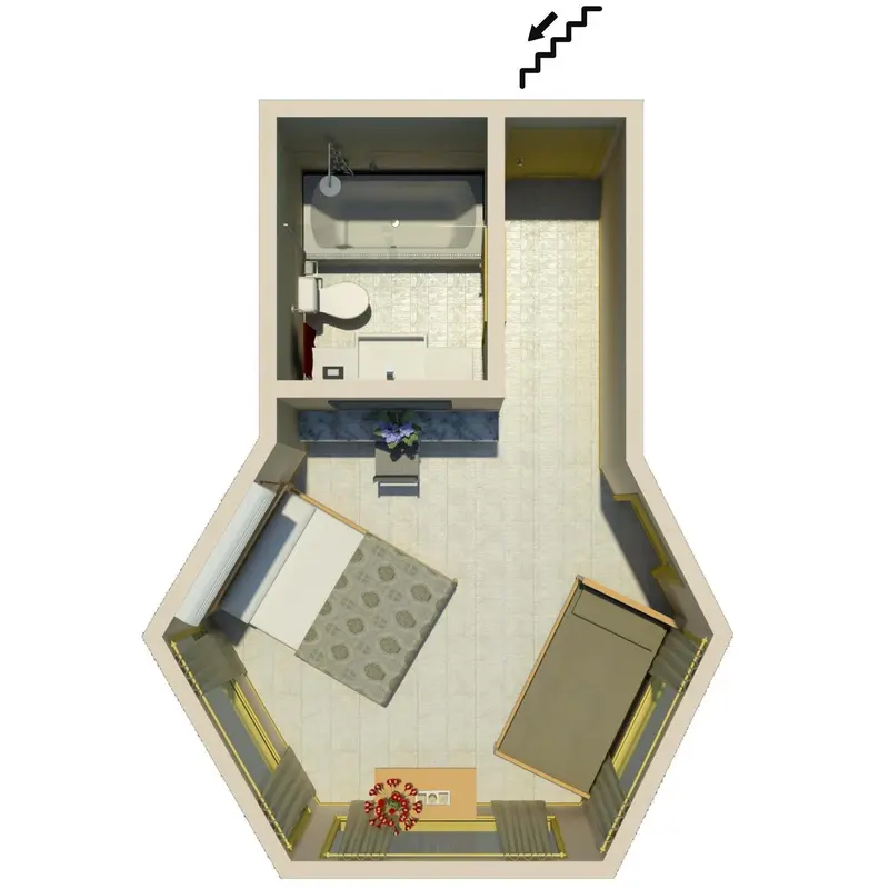 Vue d'ensemble d'une chambre avec salle de bain intégrée et coin salon.