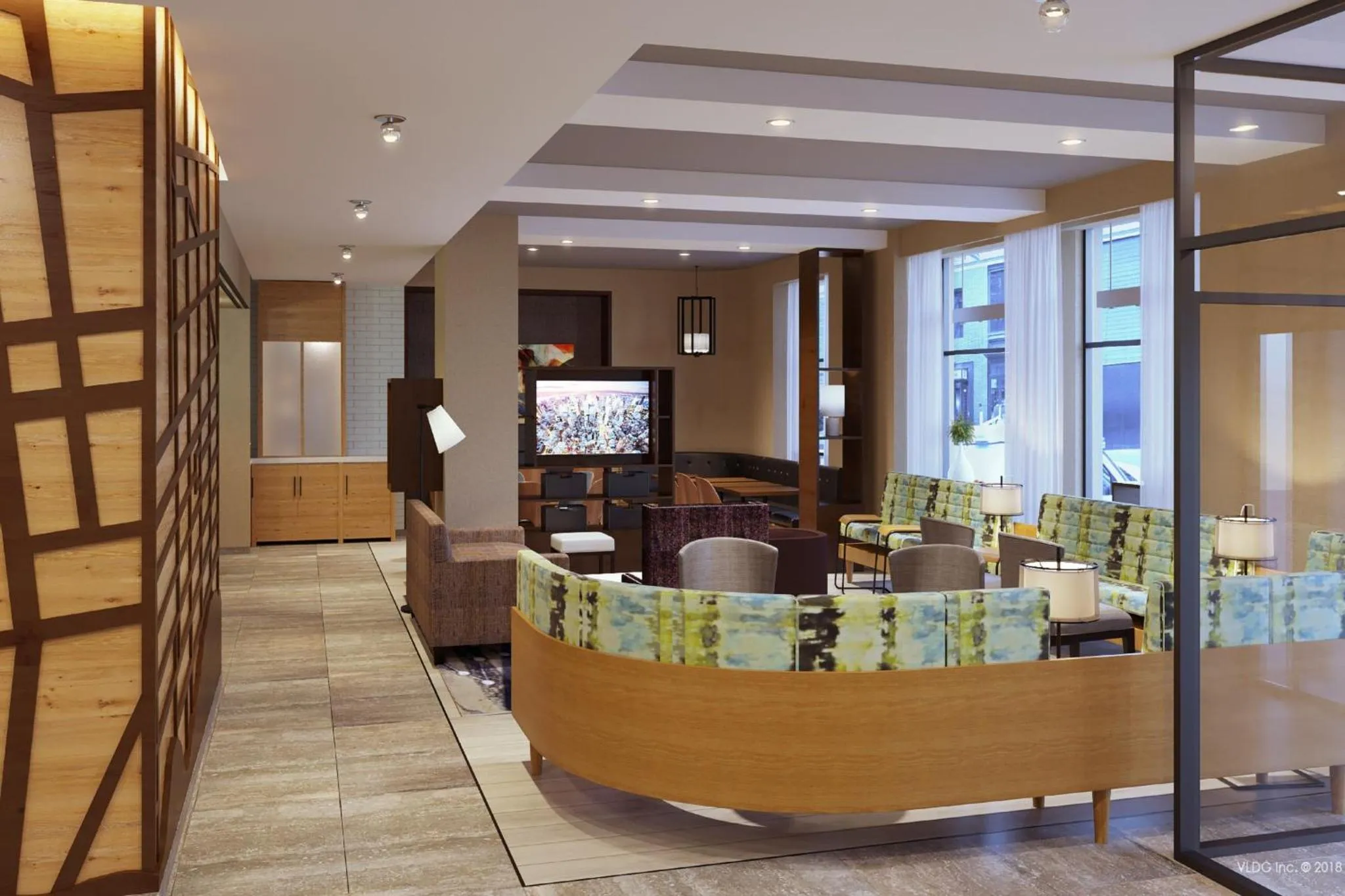 Espace de détente lumineux avec canapés et fauteuils confortables.