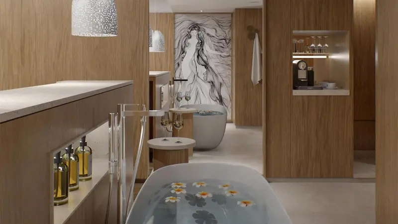 Une baignoire remplie d'eau et de fleurs se trouve dans une salle de bain lumineuse.
