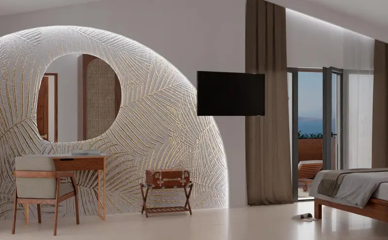 Une chambre moderne avec un bureau et un lit donnant sur une vue mer.