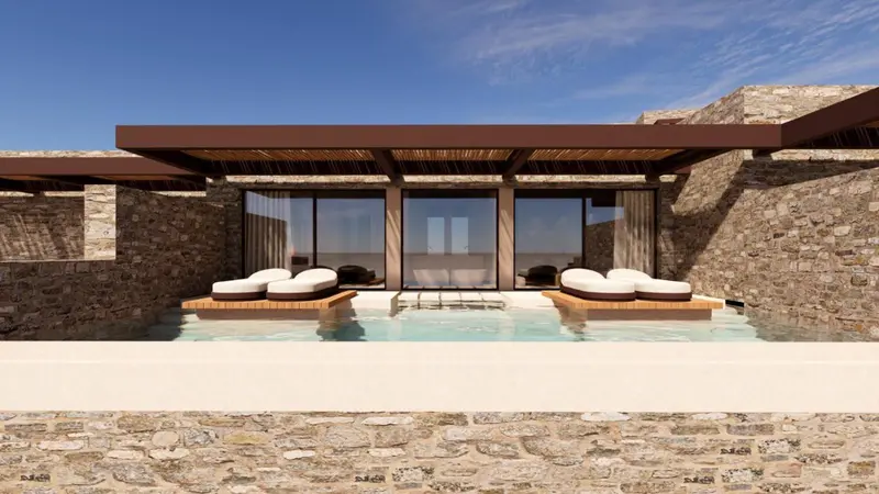 Terrasse avec piscine et mobilier de relaxation.