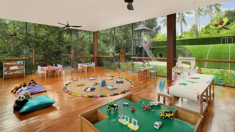 Espace de jeux pour enfants avec tapis coloré et jouets.