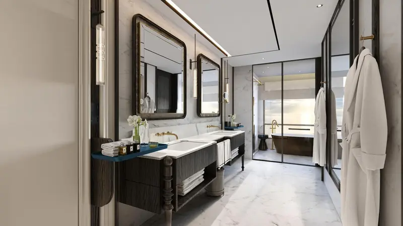 Une salle de bain moderne avec deux vasques et une douche à l'italienne.