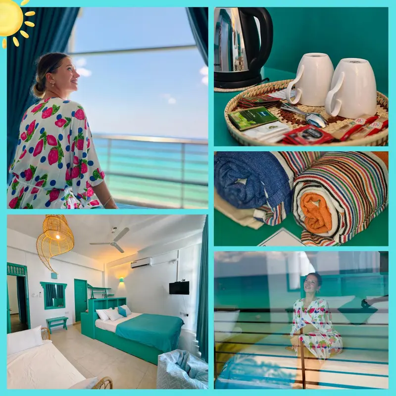 Une femme regarde par la fenêtre d'une chambre lumineuse avec vue sur la mer.