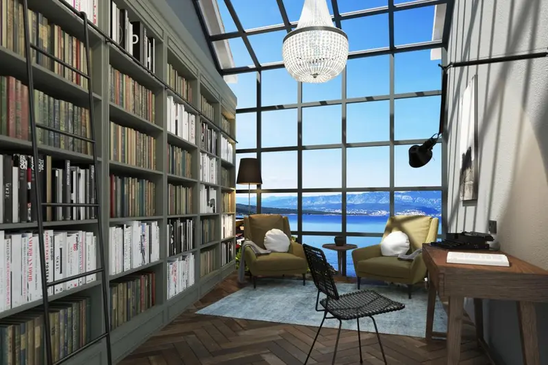 Une bibliothèque lumineuse s'ouvre sur une vue dégagée sur la mer.