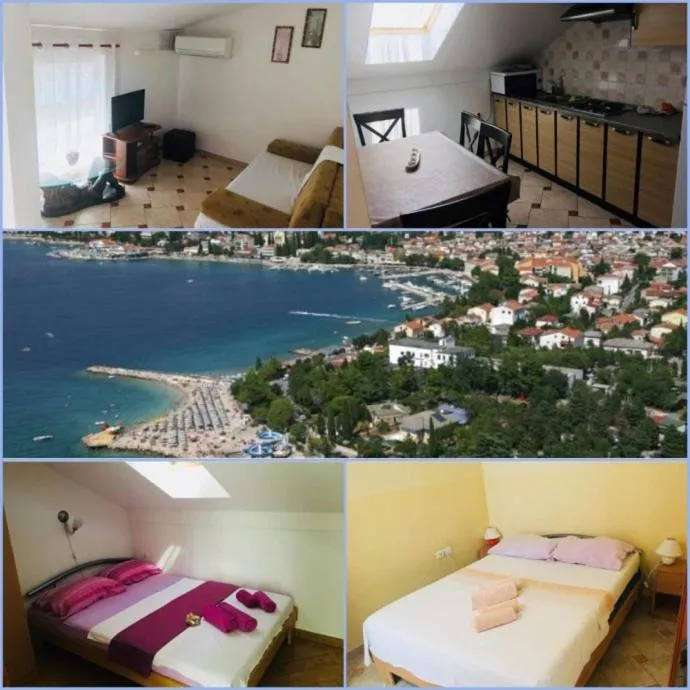 Une vue sur la mer et une ville côtière depuis un logement lumineux.