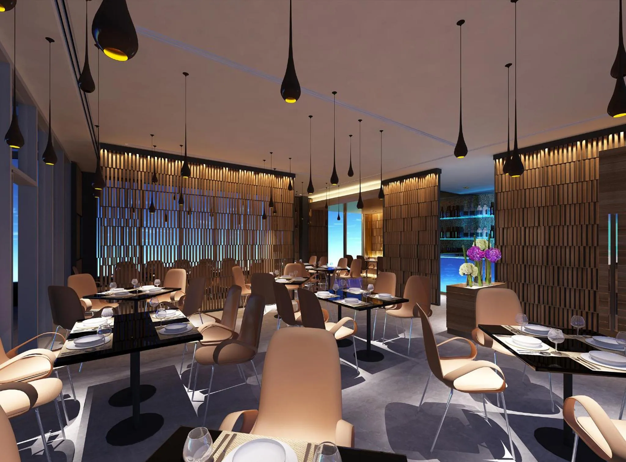 Une salle de restaurant moderne avec des tables dressées et un éclairage suspendu.