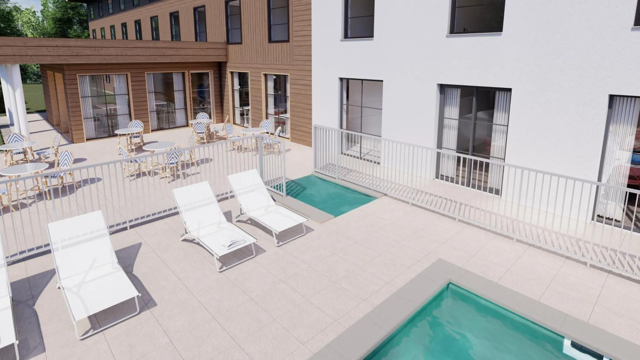 Terrasse avec transats et tables basses près d'une piscine.