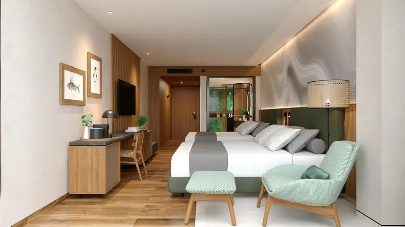 Chambre moderne avec un grand lit et un espace détente.