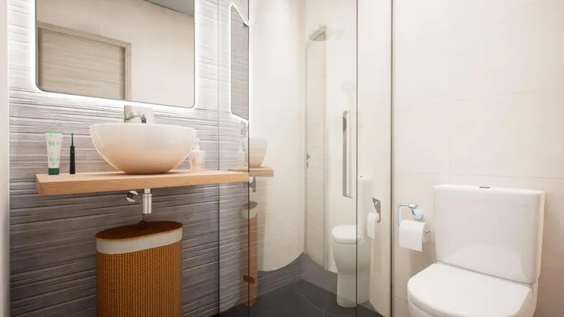 Une salle de bain moderne avec douche et toilettes.
