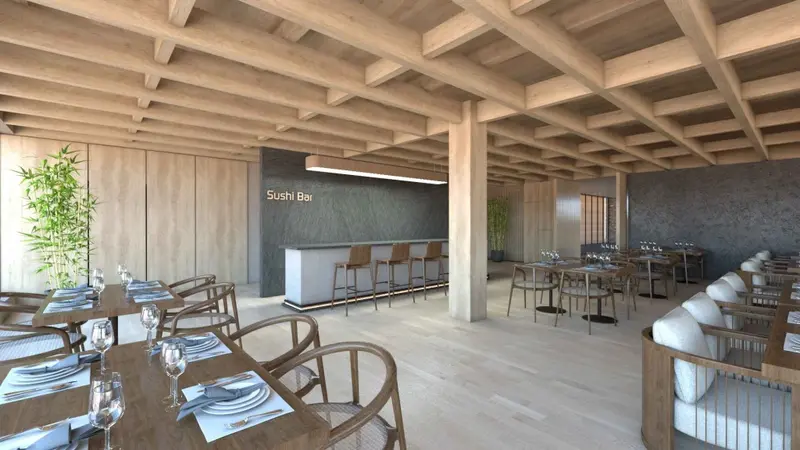 Une salle de restaurant lumineuse avec des tables dressées et un comptoir de bar.