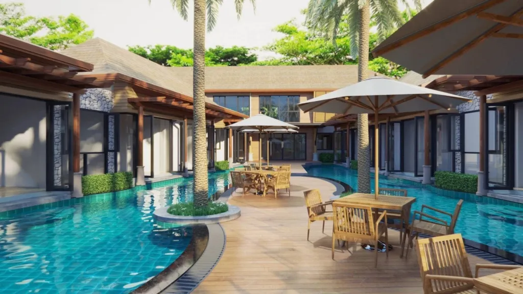 Terrasse aménagée avec tables et parasols autour d'une piscine sinueuse.